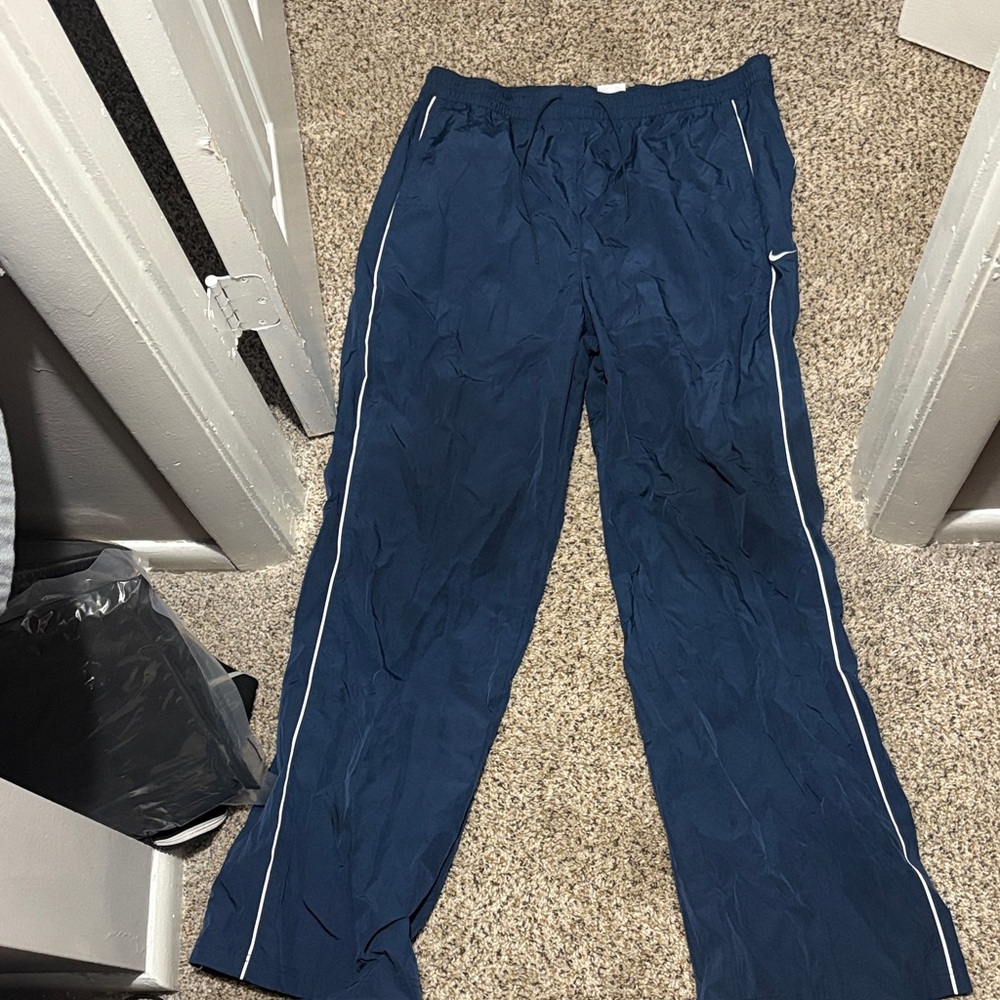 Nike Blue Track Pants with White Stripes